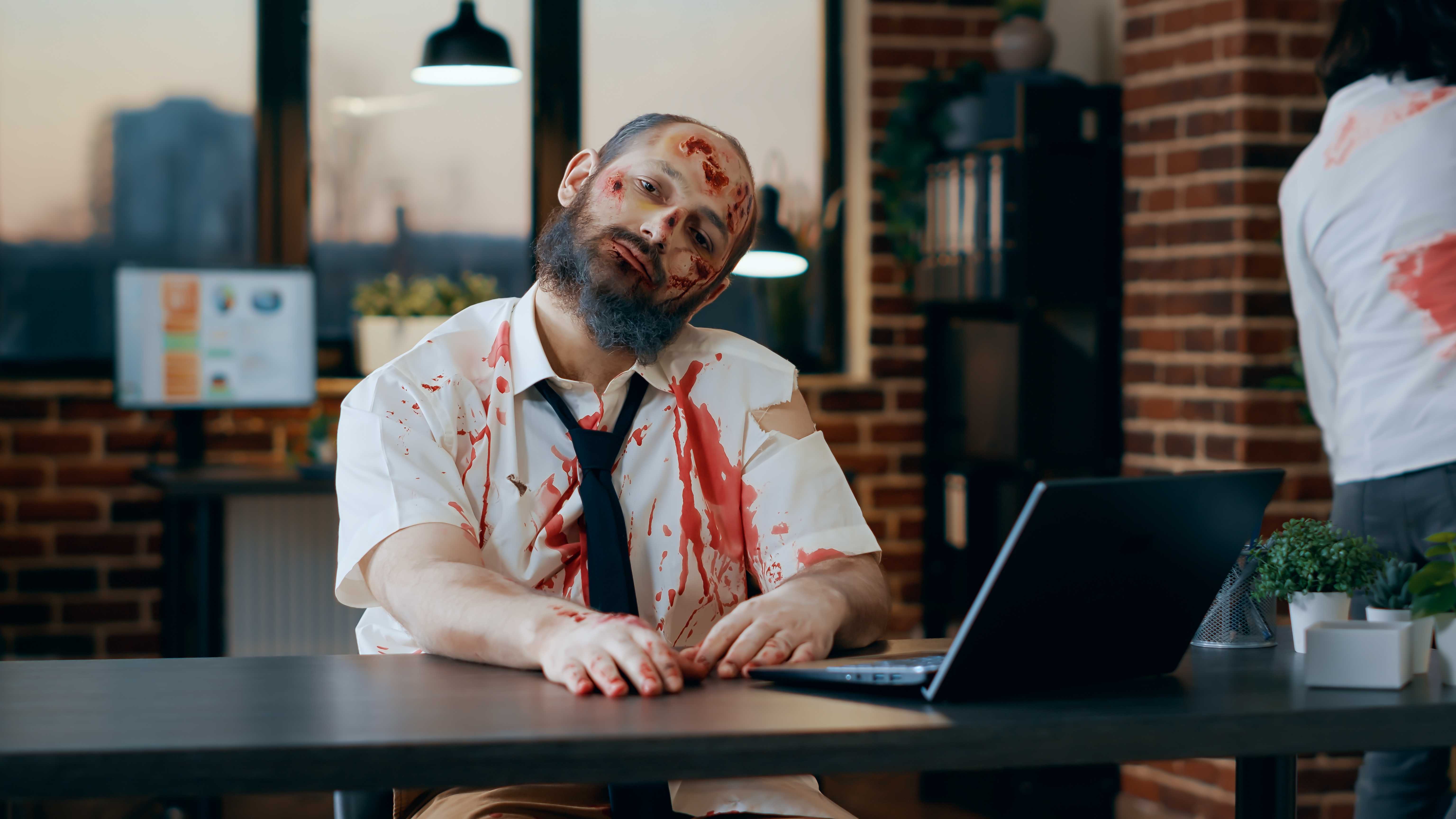 bizarre-looking-zombie-using-modern-laptop-office-workspace-evil-apocalyptic-brain-eating-monster-with-deep-bloody-wounds-scars-trying-use-portable-computer-work.jpg