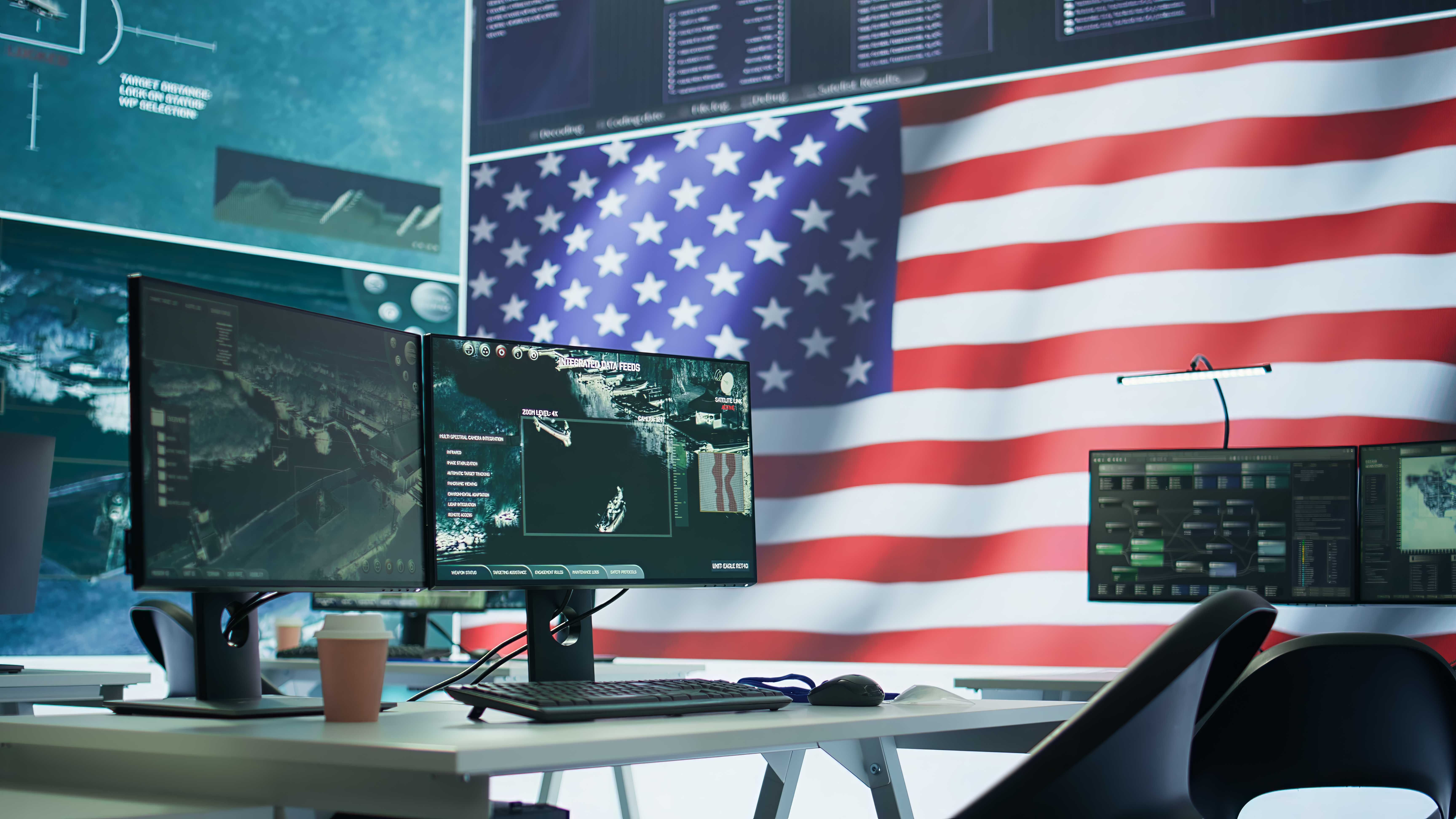 empty-operation-room-with-american-flag-running-big-screen-control-tower.jpg