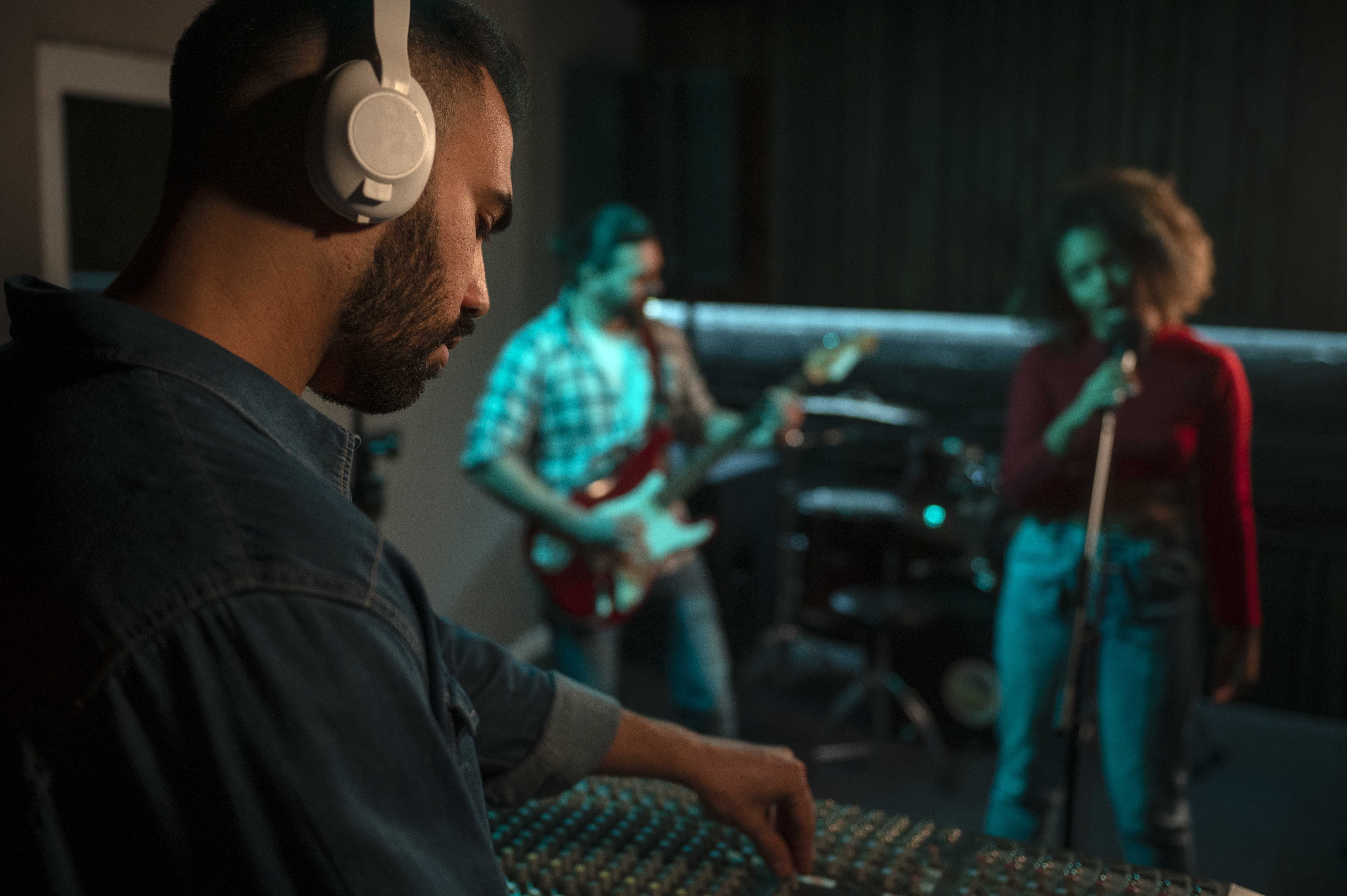 side-view-musicians-working-studio.jpg