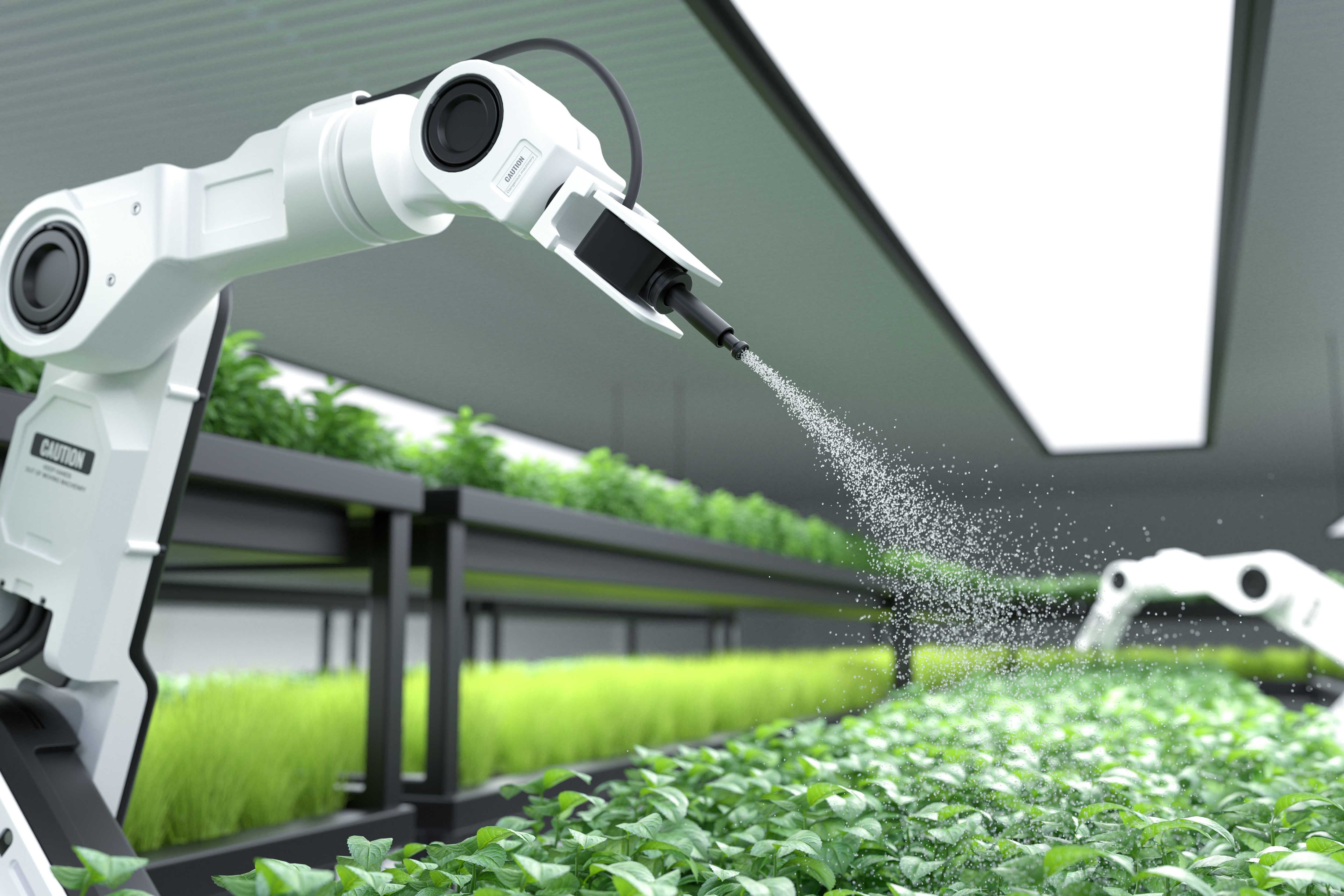 smart-robotic-farmer-spraying-fertilizer-vegetable-green-plants.jpg